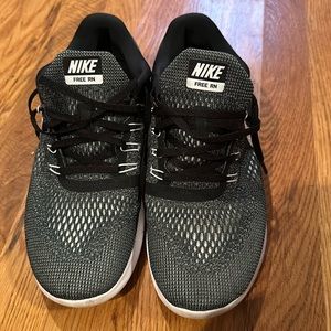 Nike Free RN black,lightly used well taken care of not used for running.